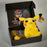 Limited edition Vault Box retro gaming subscription from BJ’s Game Vault featuring Pokémon Pikachu plush exclusive ROM hack games and collector items