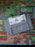 SNES Burn IN Test Cart Game cartridge on a colorful game cartridge  reprobackground