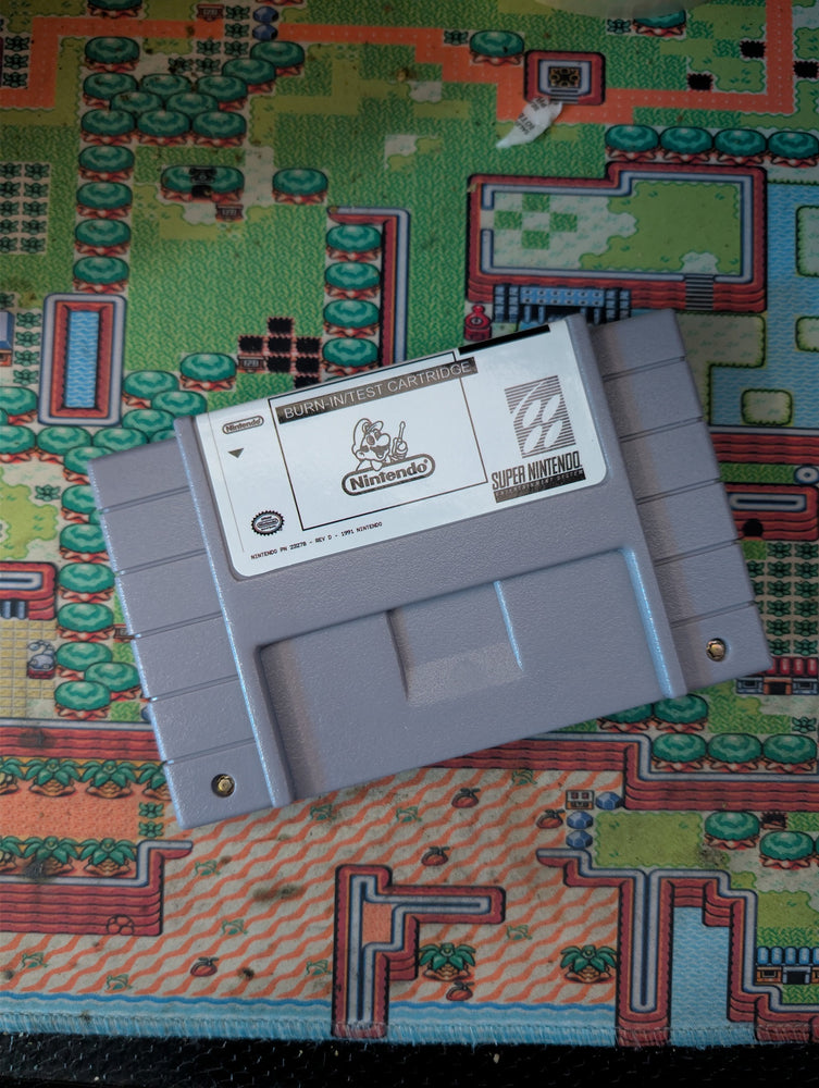SNES Burn IN Test Cart Game cartridge on a colorful game cartridge  reprobackground