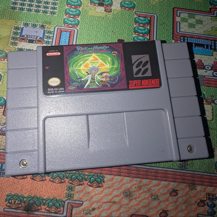 Rick and Morty ALTTP Rom hack Cartridge Super Nintendo Entertainment System (SNES) game cartridge on a colorful game console layout