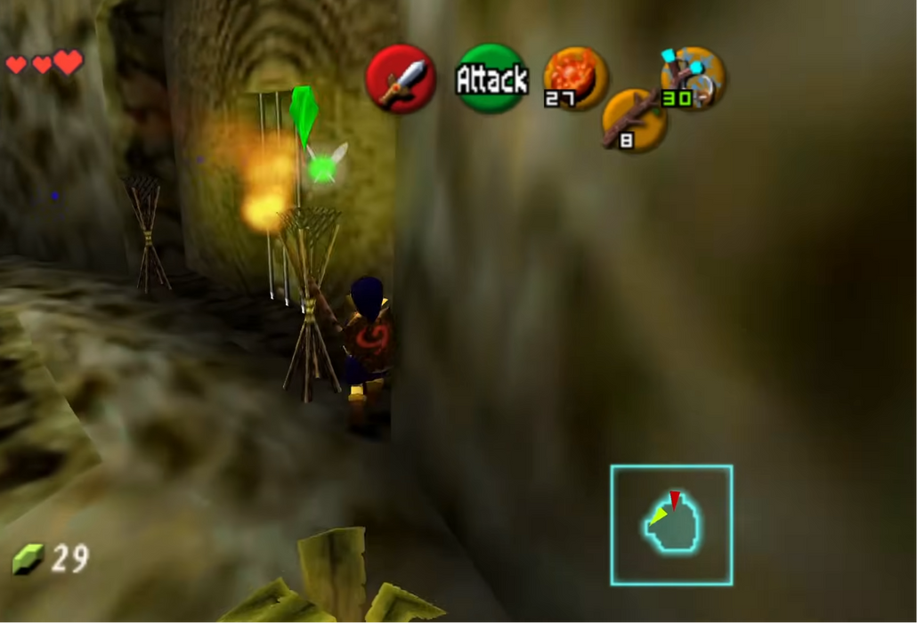 A screenshot from a retro video game showing a character in a dimly lit stone corridor with torches, overlaid with a small streamer webcam in the top-left corner and game UI elements including attack icons and a minimap.