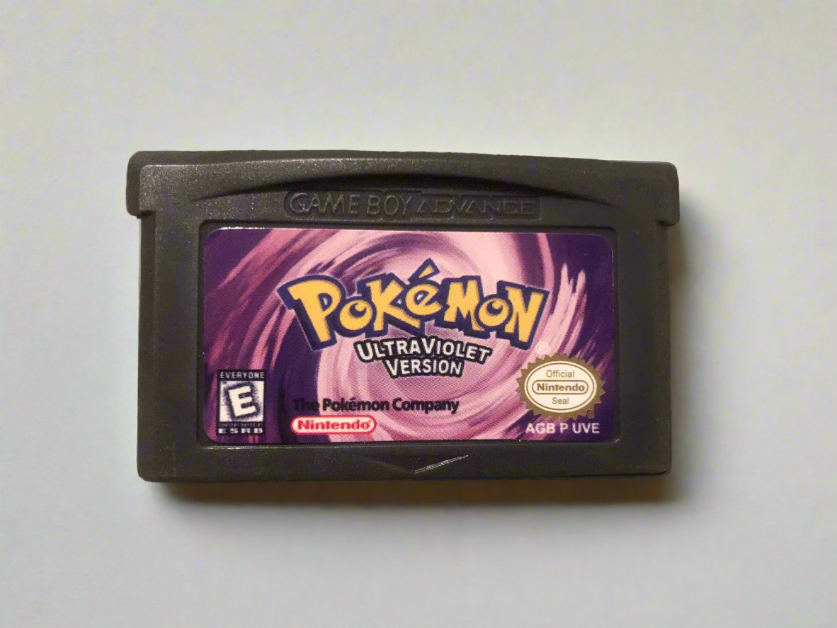 Pokémon UltraViolet Version Game Boy Advance game cartridge on a carpeted surface